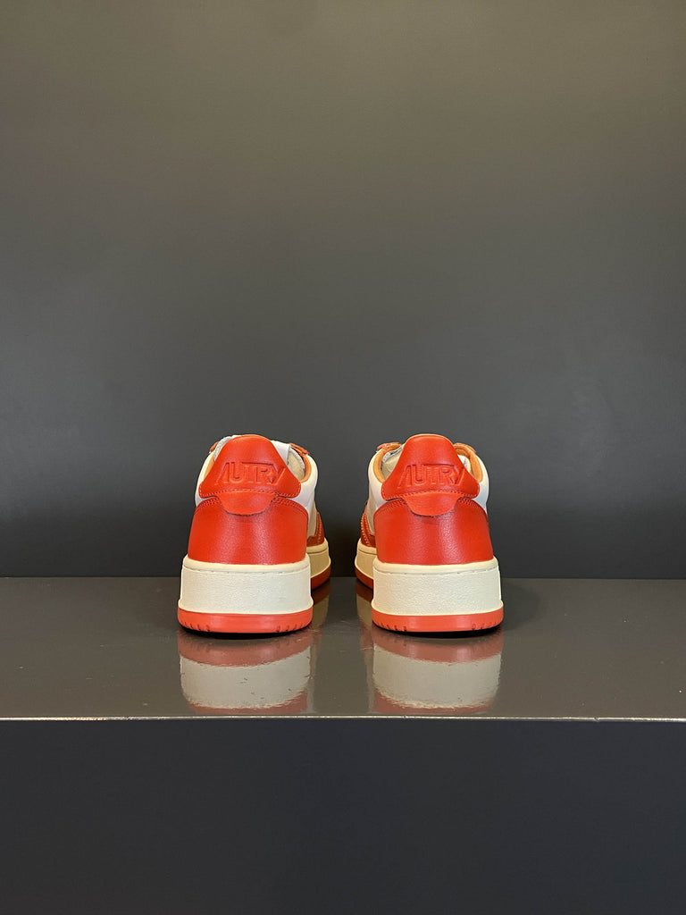 Medalist Low sneakers in pelle bianca e arancio